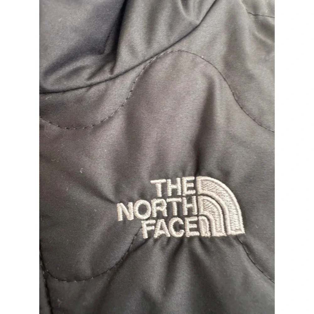 The North Face baby black snowsuit size 6-12 months